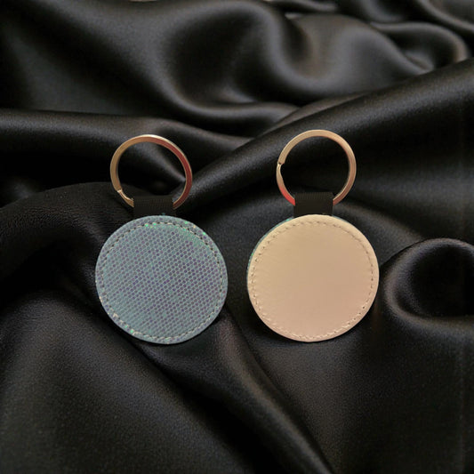 Porte clé rond bleu à paillettes