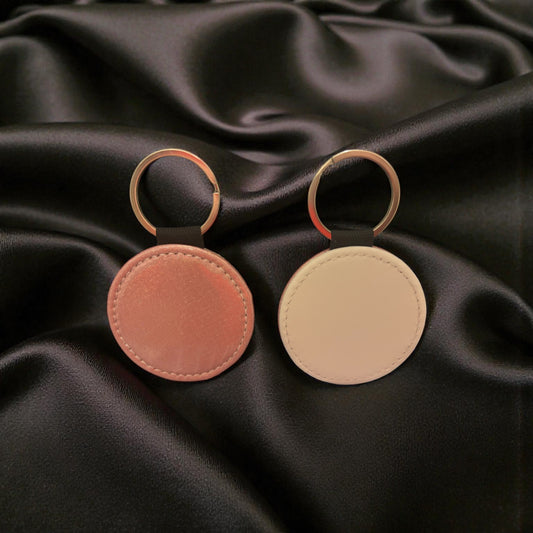 Porte clé rond rose à paillettes